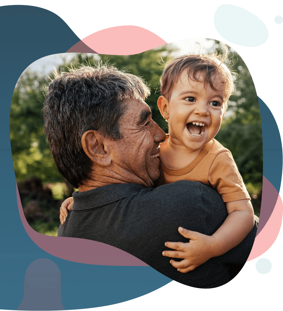 Old man holding a child image